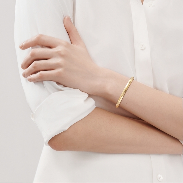 X Closed Narrow Hinged Bangle in Yellow Gold with Diamonds