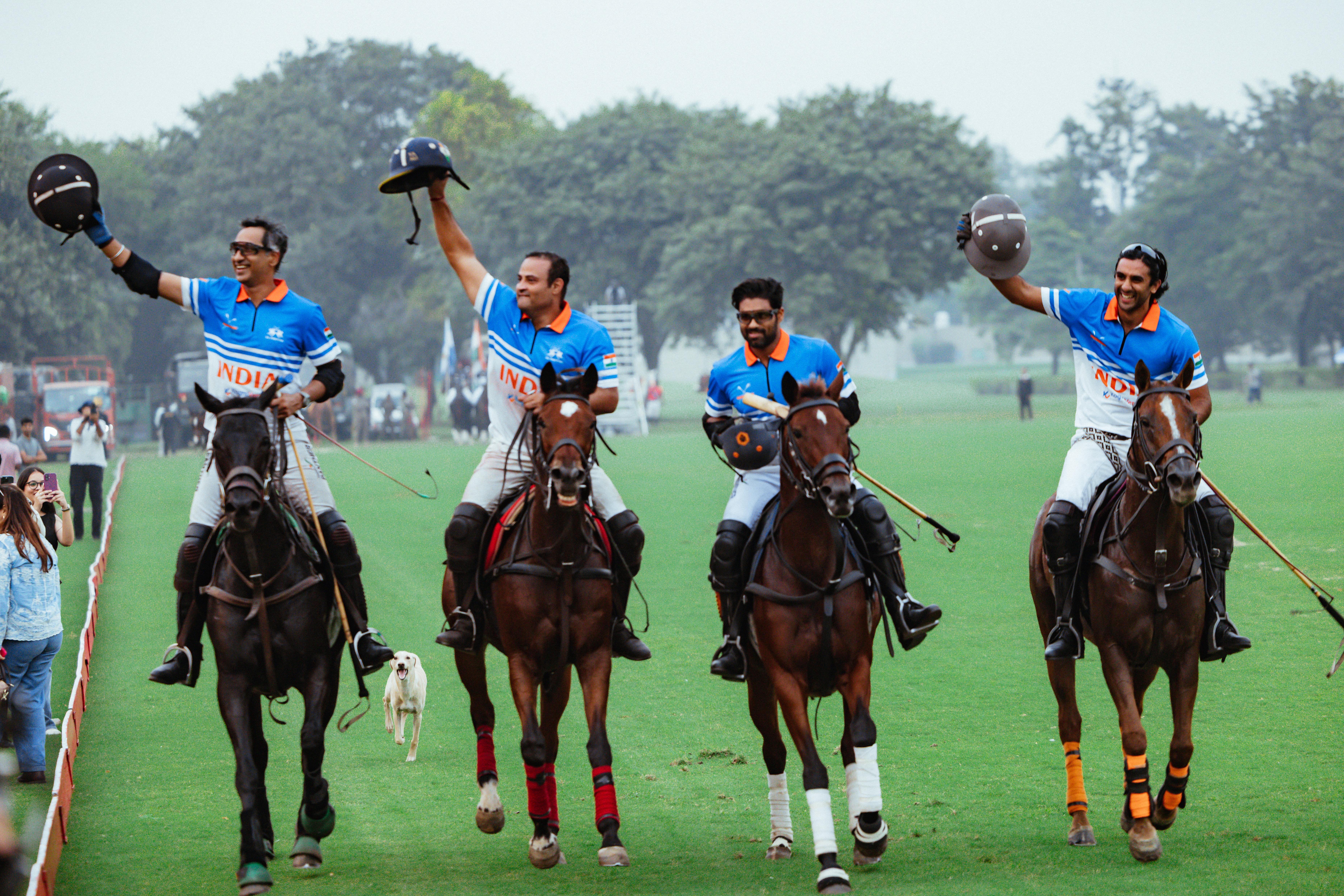 Polo players celebrating