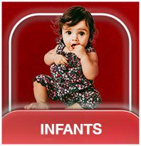 Infants % category. Curious baby in a floral romper, hand near mouth.