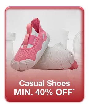 Minimum forty percent off casual shoes. Pink and white slip on sneakers.