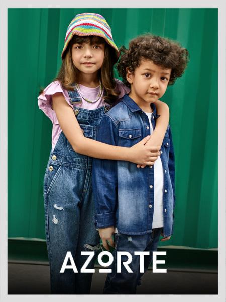 Azorte kids' fashion. Girl in distressed denim overalls and a striped bucket hat. Boy in a denim shirt and distressed jeans.