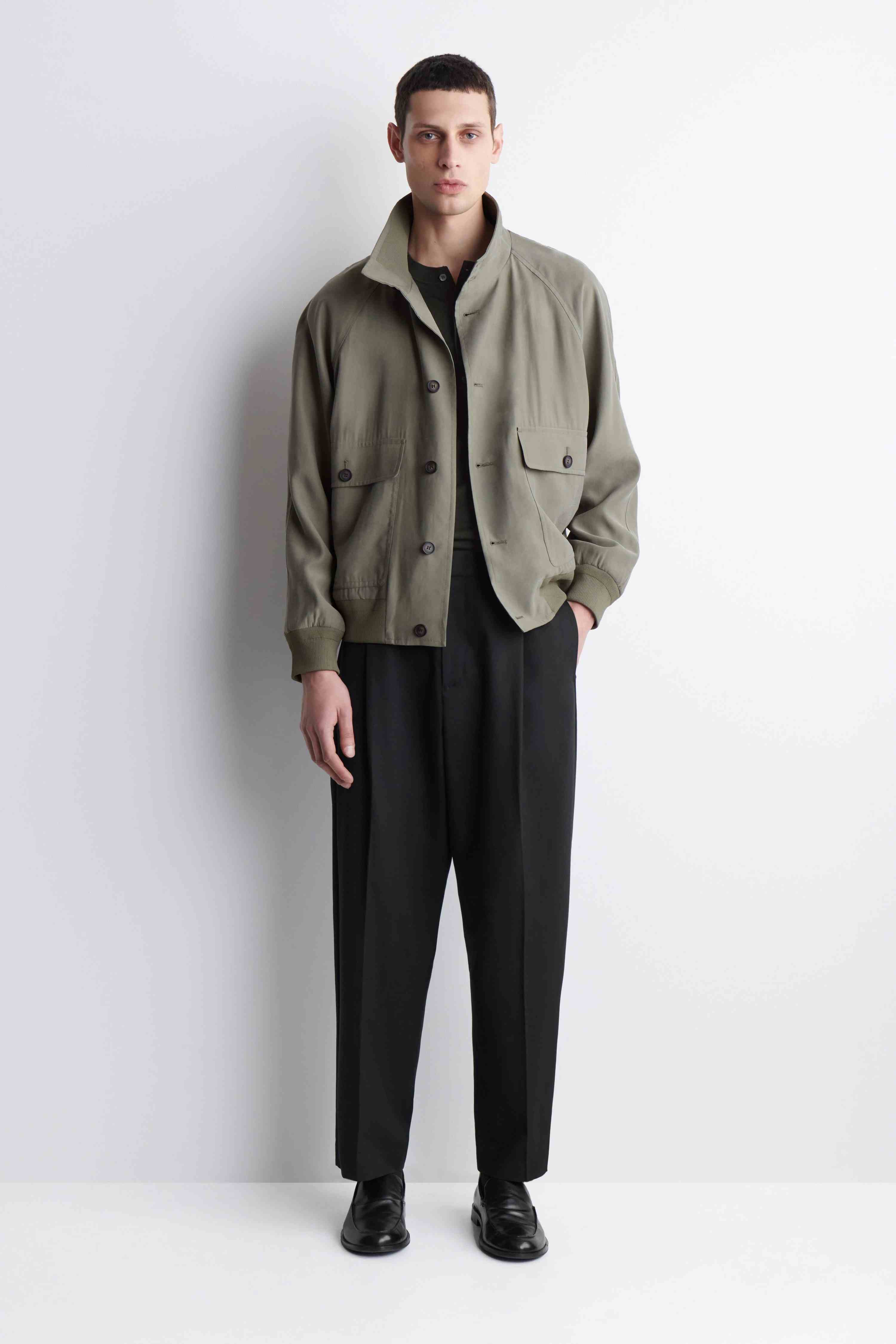 PLEATED RELAXED-FIT TAPERED TROUSERS - 1