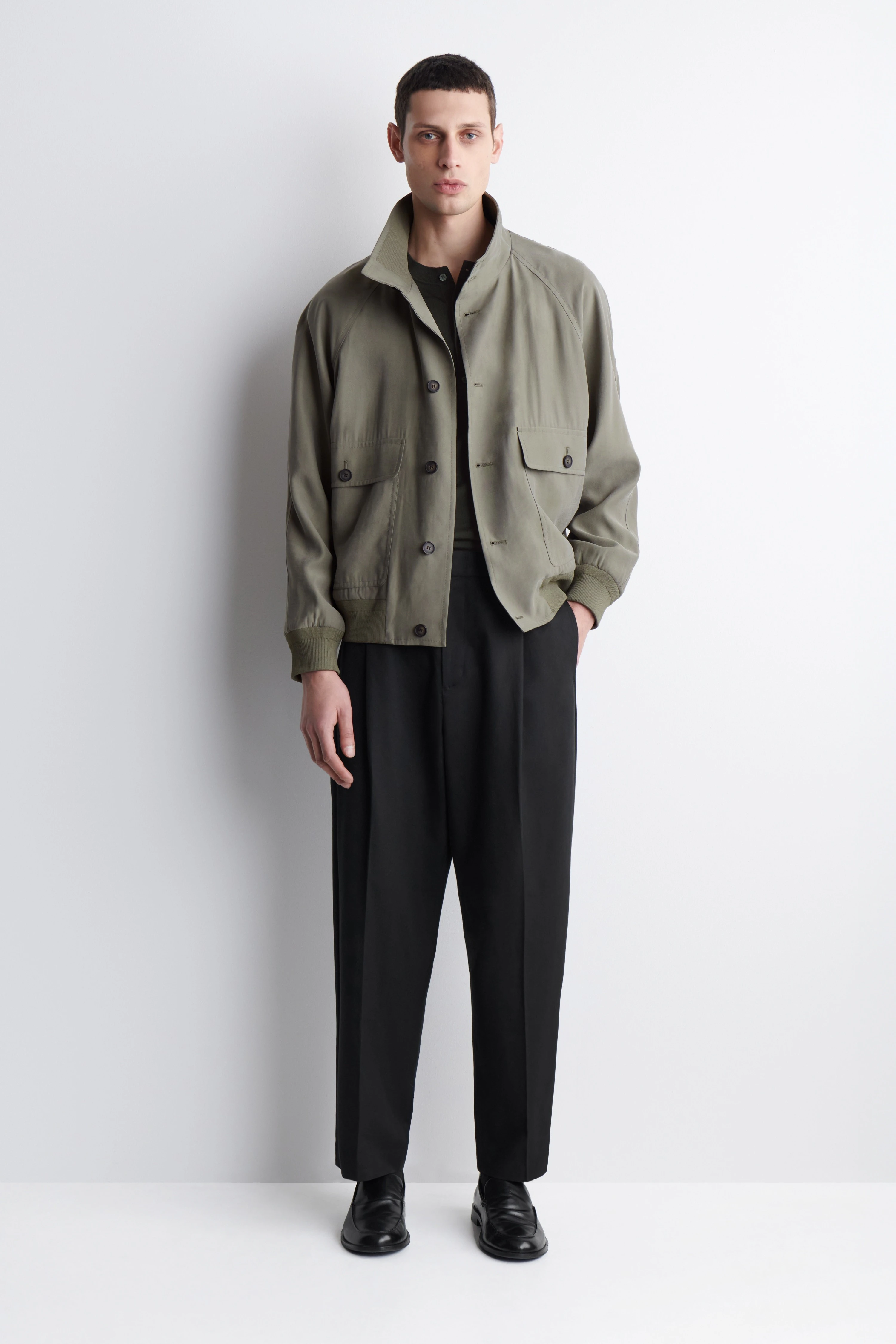 PLEATED RELAXED-FIT TAPERED TROUSERS - 1