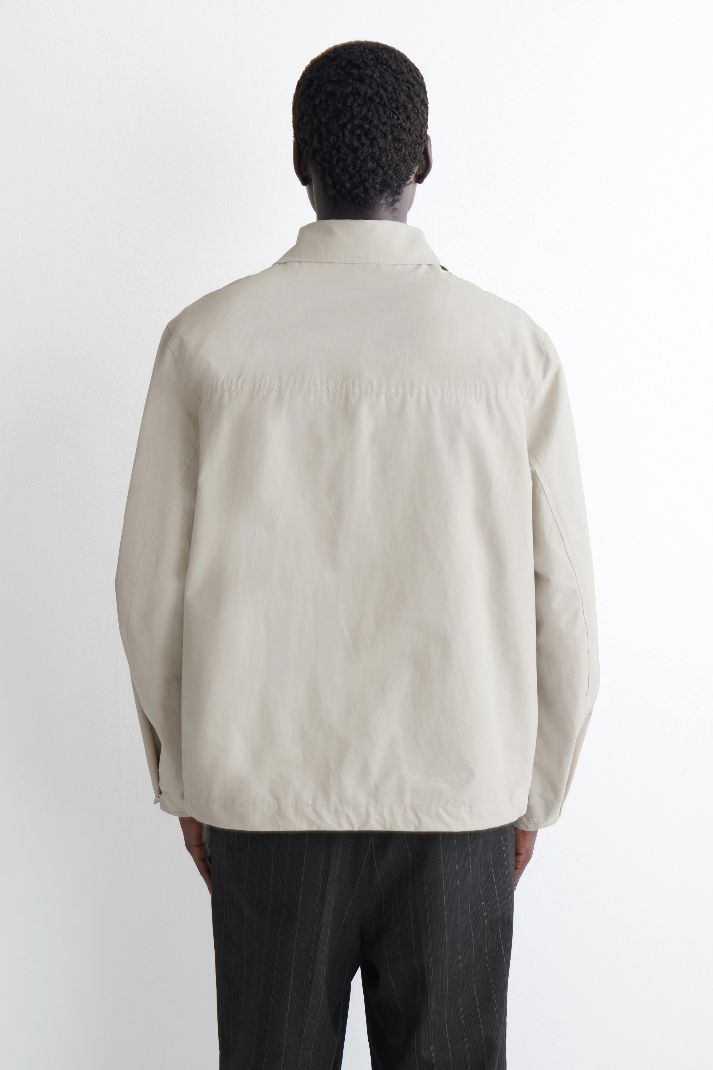 PACKABLE-HOOD WINDBREAKER JACKET