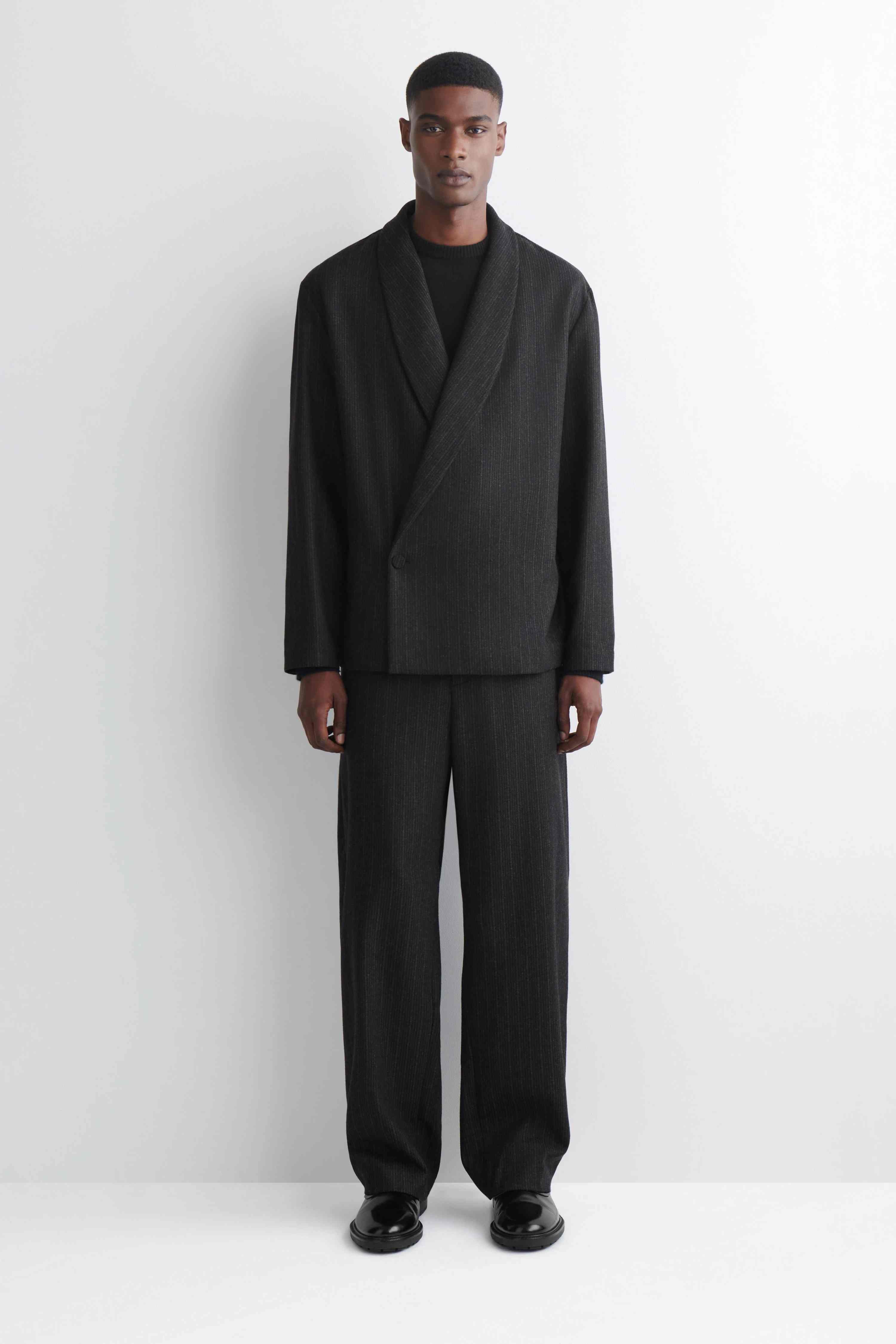PINSTRIPED WOOL RELAXED-FIT TAPERED TROUSERS - 1