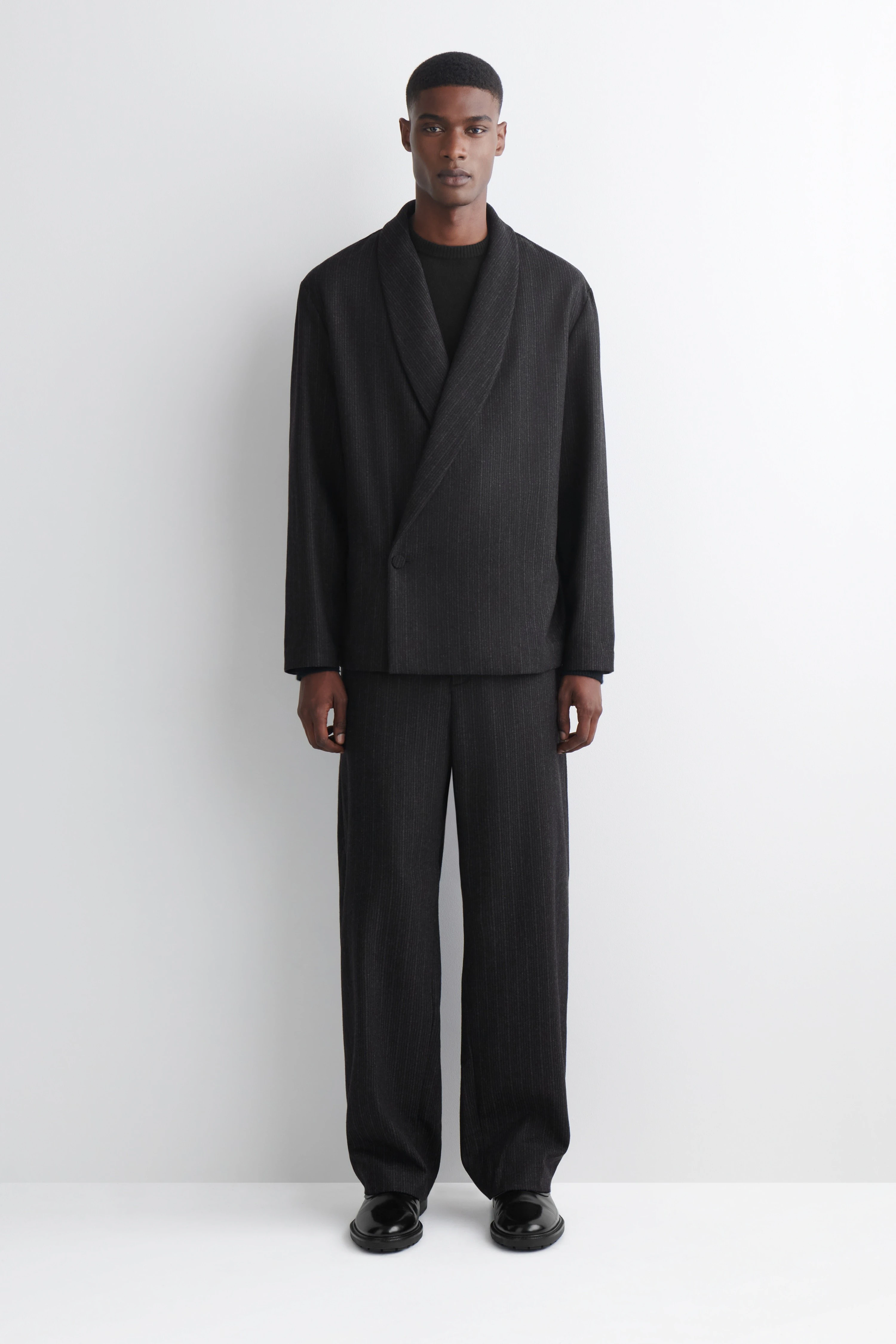 PINSTRIPED WOOL RELAXED-FIT TAPERED TROUSERS - 1