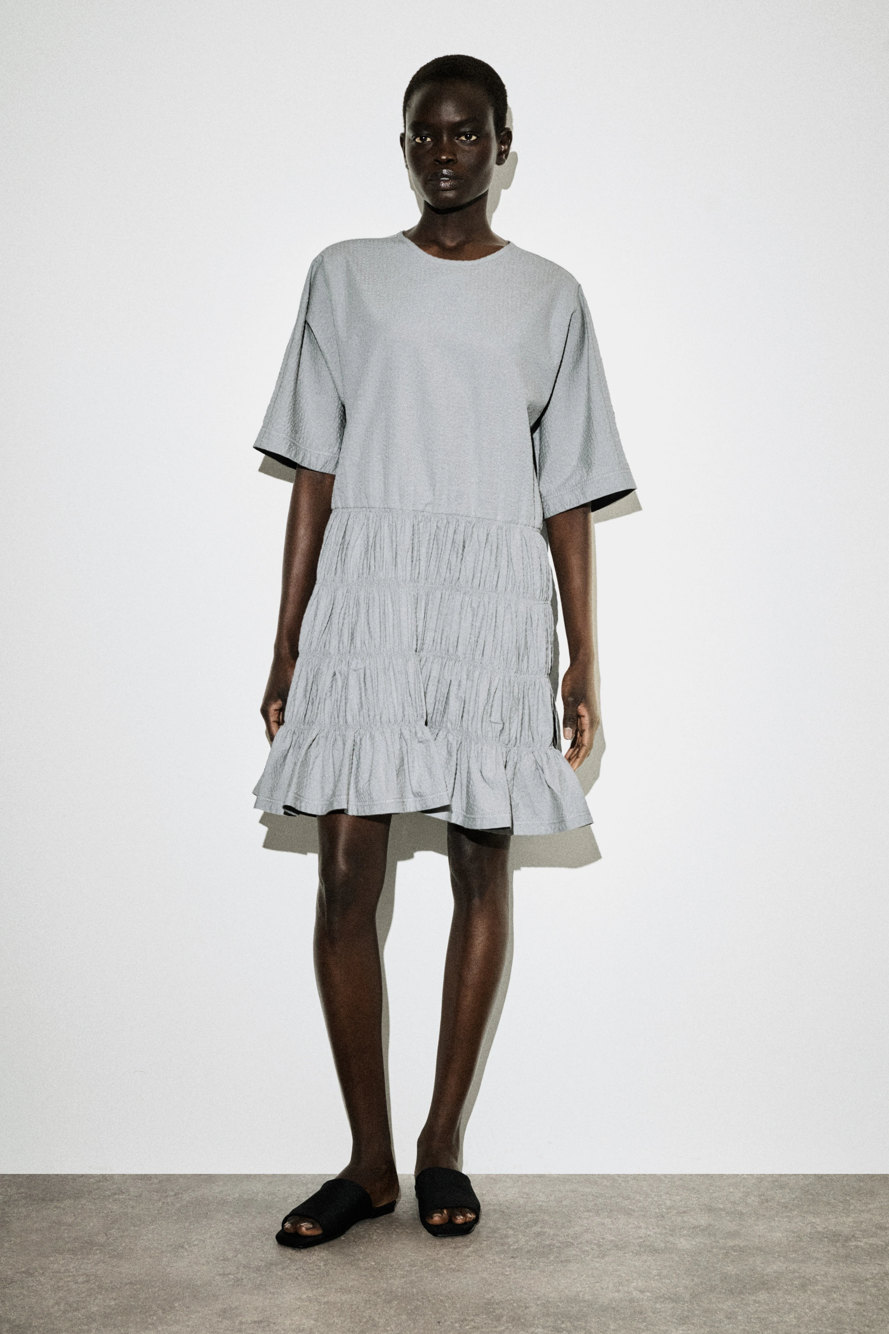 SMOCKED SEERSUCKER MINI DRESS