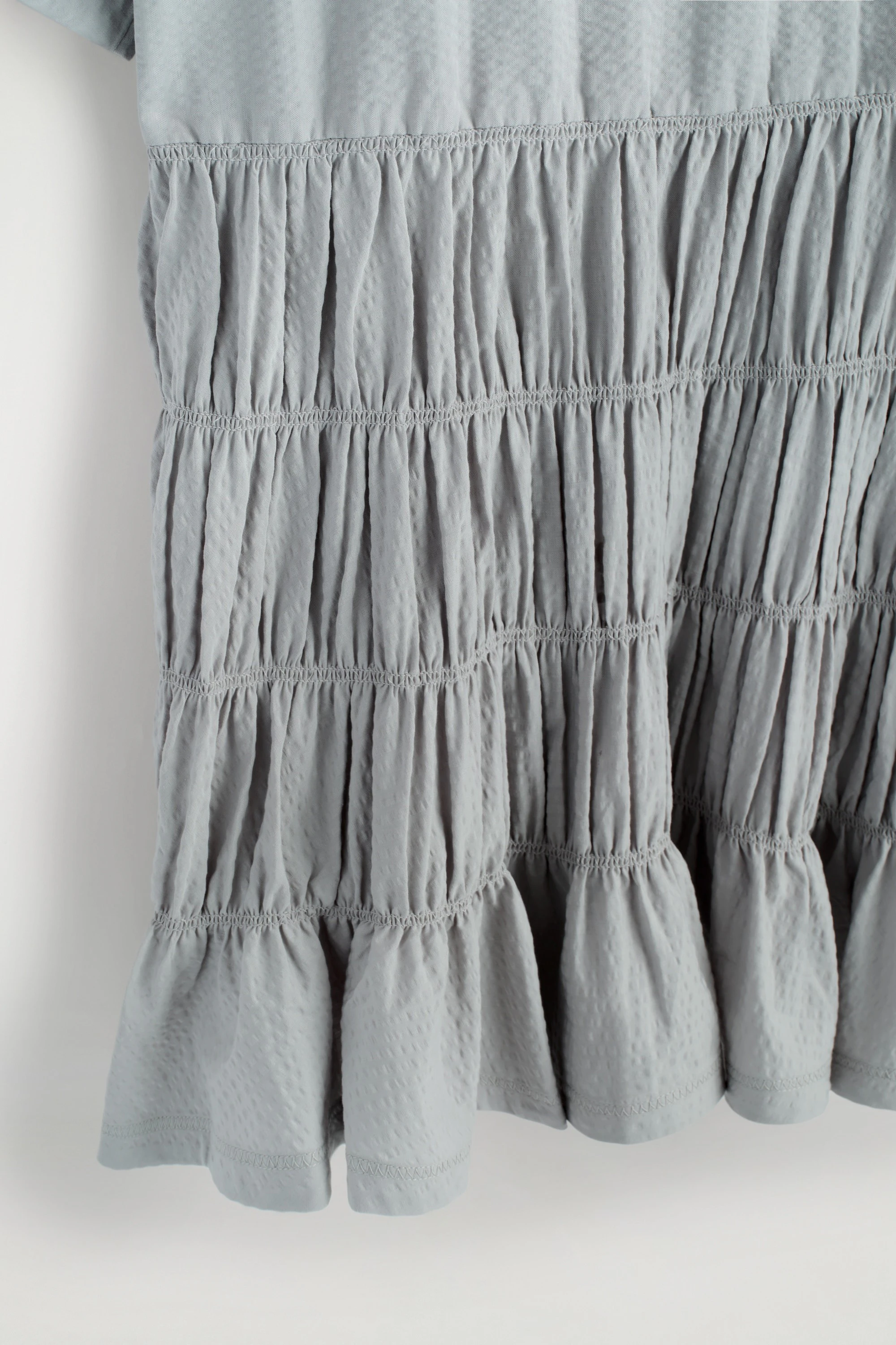 SMOCKED SEERSUCKER MINI DRESS - 6