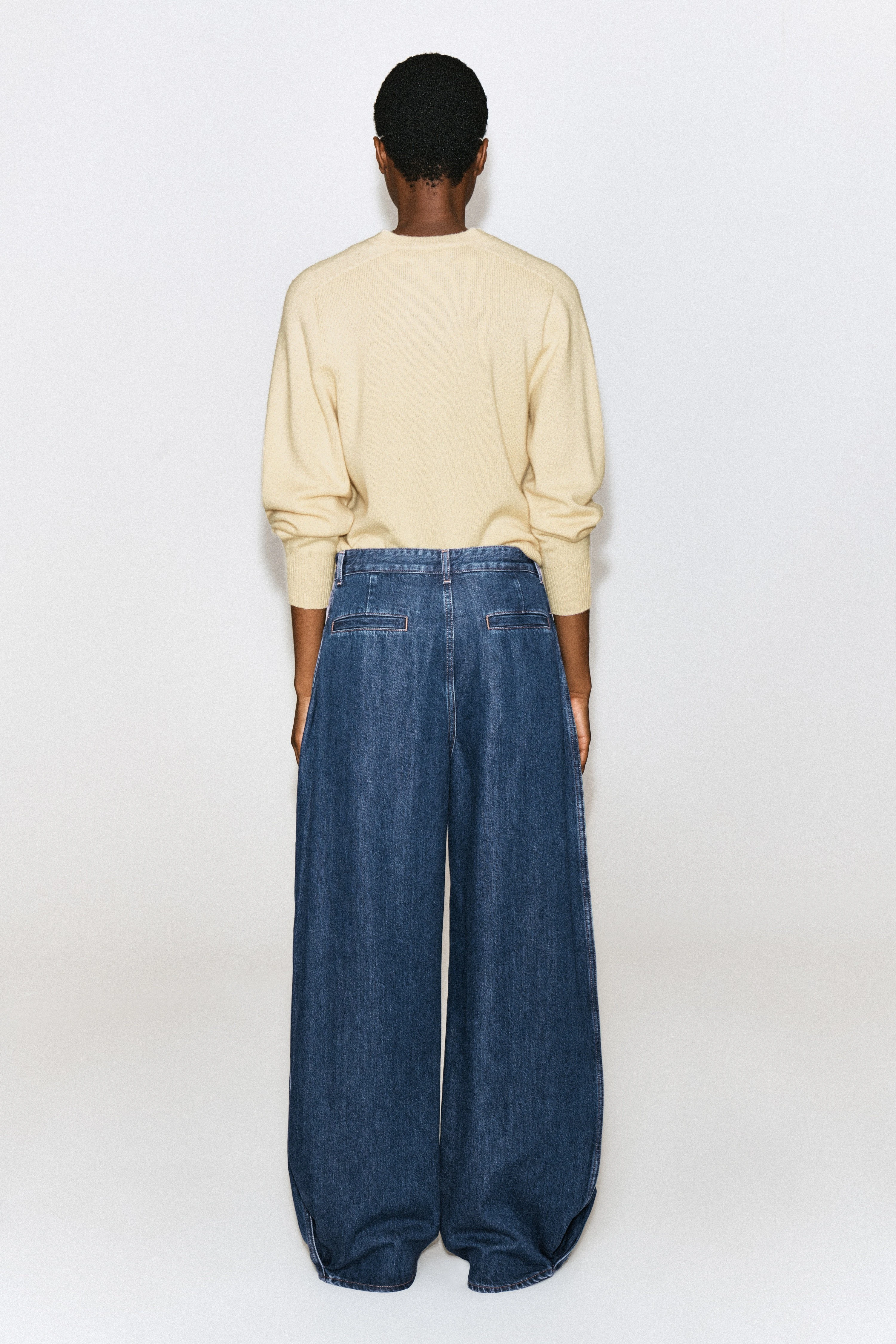PLEATED-PANEL DENIM BARREL-LEG TROUSERS