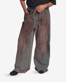 Oversized unisex denim with hand-painted whitewash surface (Indigo)