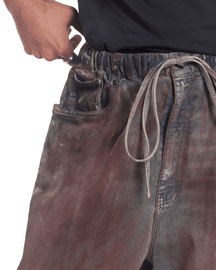 Oversized unisex denim with hand-painted whitewash surface (Indigo)