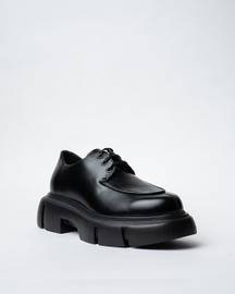Laced Derby Shoes With a Rounded Toe and Chunky Sole.