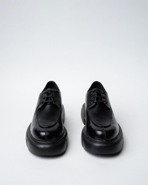 Laced Derby Shoes With a Rounded Toe and Chunky Sole.