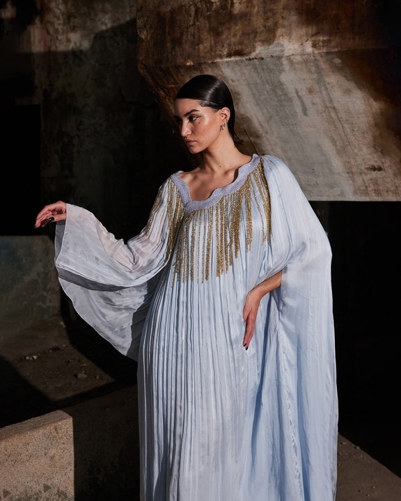 The Crystal Asymmetric Kaftan