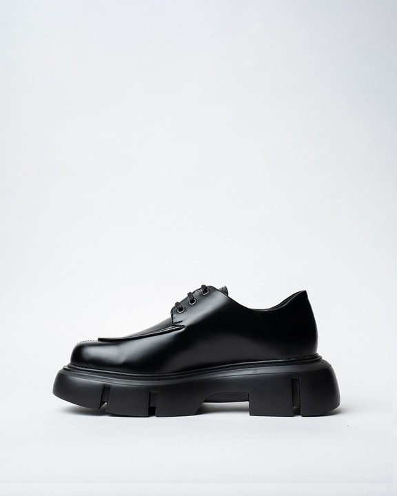 Laced Derby Shoes With a Rounded Toe and Chunky Sole.