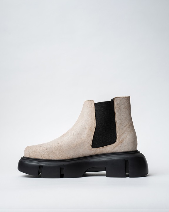 Chelsea Boots With A Rounded Toe And Chunky Sole.