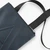 A Line Shoulder Bag With Embossed Branding