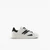 Round Toe Leather Sneaker With Green Accents And Lace Detailing