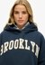 ATHLETIC ESSENTIAL RELAXED HOOD