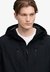 WATERPROOF TECH JACKET