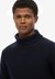 MERCHANT TEXTURED ROLL NECK
