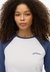 ESSENTIAL LOGO RETRO LS TOP