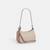 Teri Mini Crossbody Bag In Signature Canvas