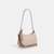 Teri Mini Crossbody Bag In Signature Canvas
