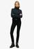 SLOUCHY CABLE ROLL NECK