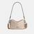 Mini Carey Crossbody Bag In Signature Canvas