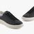 Coated Round Toe Sneakers With All Over Logo Heel Insert
