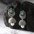 The Nila Silver Plated Floral Jhumkas