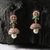 The Nila Rose Gold Green Stone Crystal Studded Jhumkas