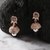 The Nila Rose Gold White Stone Crystal Studded Jhumkas