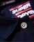 INTERNATIONAL CHEST BAND POLO