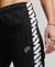 CODE S LOGO TAPE TRACK PANTS