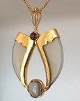 Avani Gold Faux Tiger Claw Red Lens Pendant