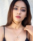 Avani Gold Faux Tiger Claw Sunburst Pendant