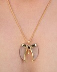 Avani Gold Faux Tiger Claw Sunburst Pendant