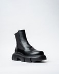 Black Bootswith A Rounded Toe And Chunky Sole