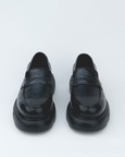 Shoes With A Rounded Toe And Chunky Sole