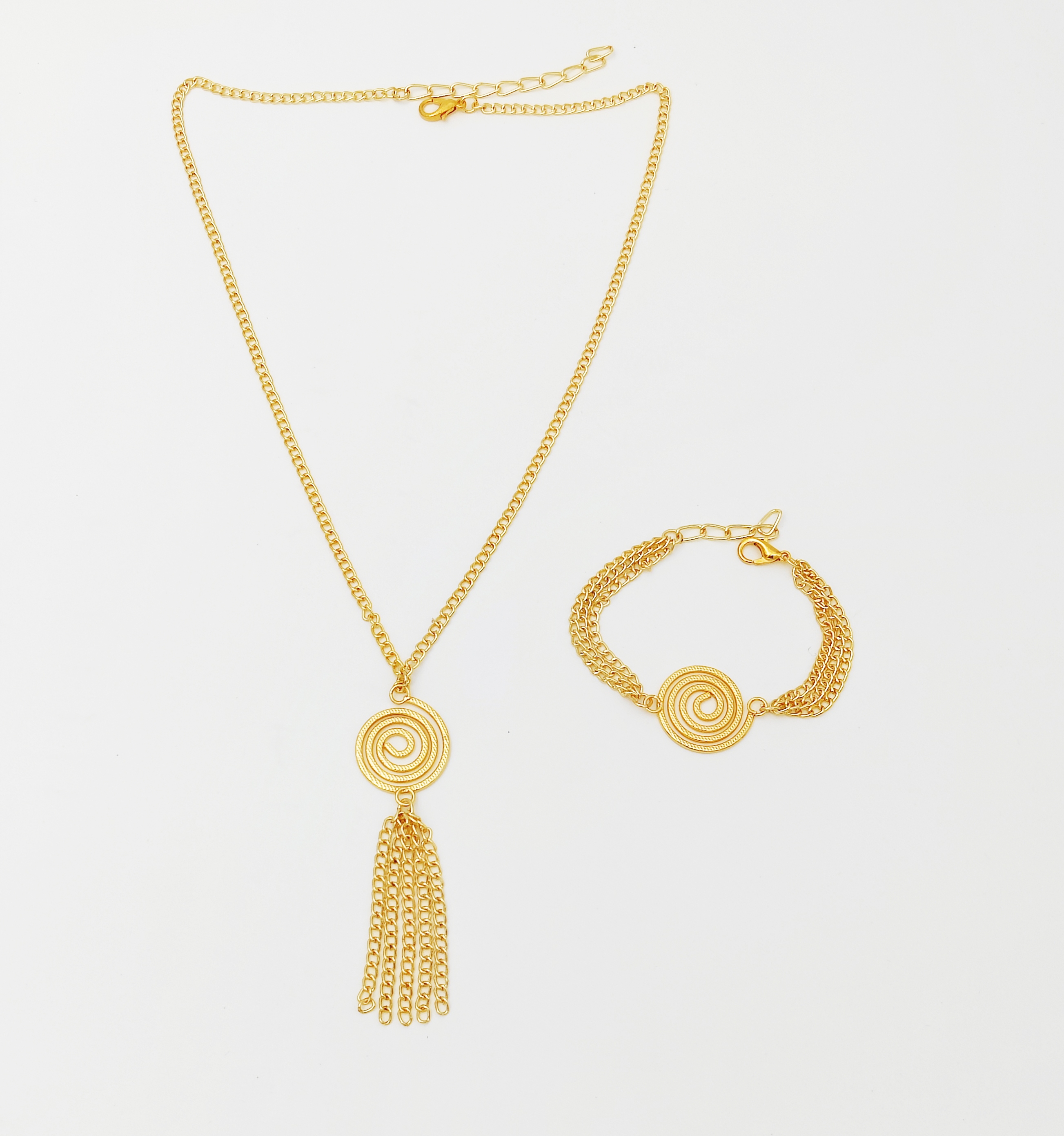 Gold Swirl Tassel Necklace & Bracelet Set