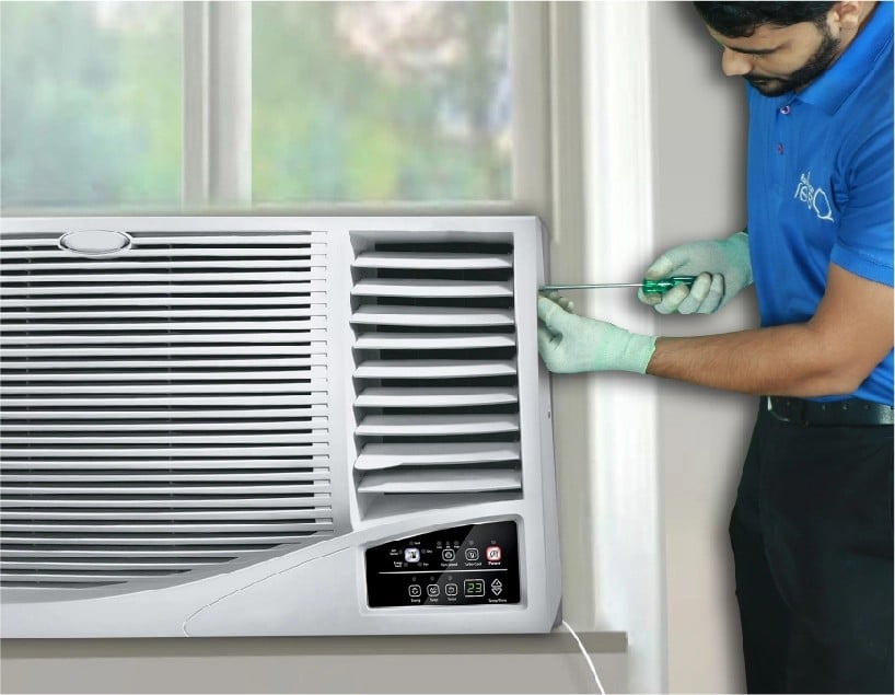 resQ technician servicing an air conditioner