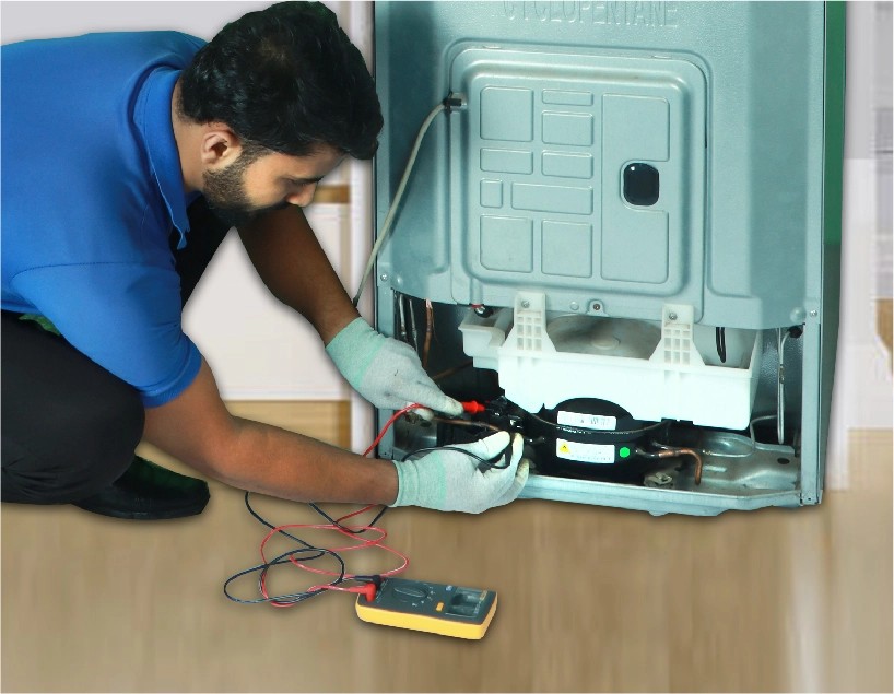 resQ certified technician servicing a refrigerator compressor