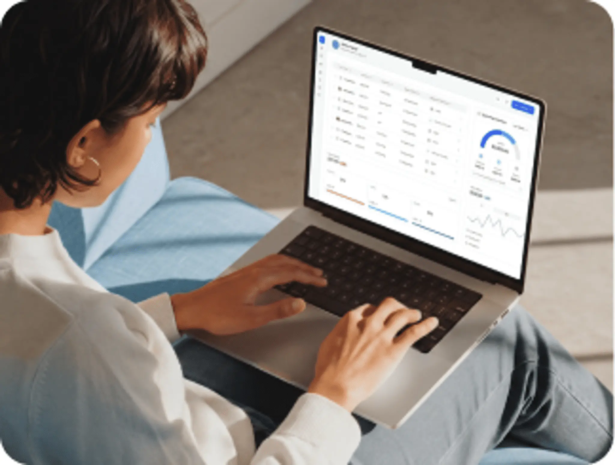 A team member reviewing catalog data on a laptop