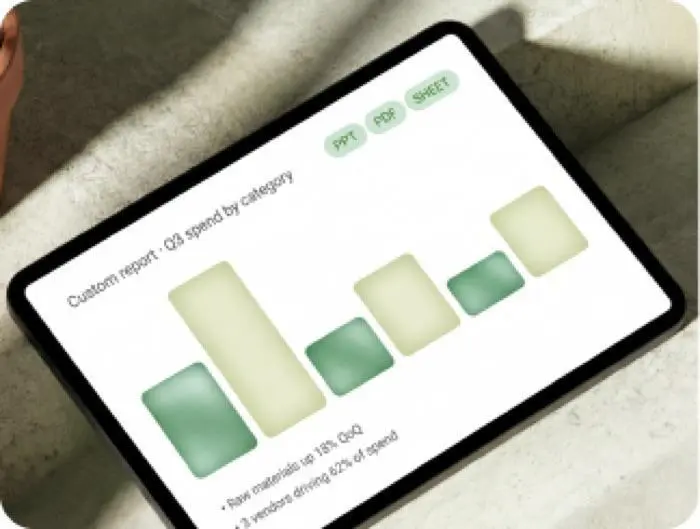 Tablet showing a custom Q3 spend by category report with a bar chart