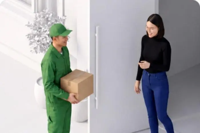 Delivery courier handing a package to a customer at their door