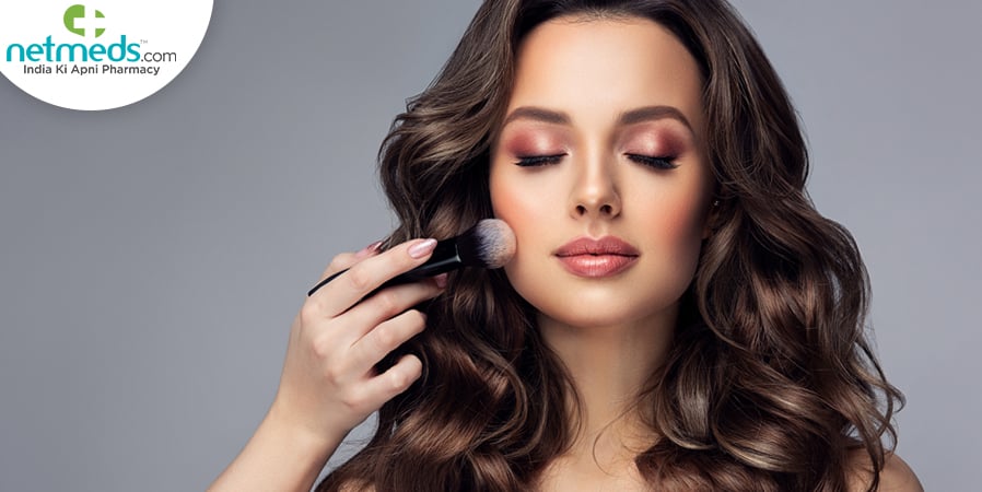 Woman applying blusher