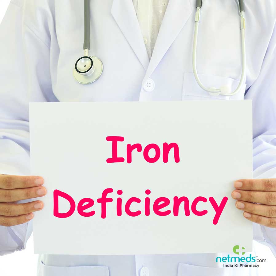 Doctor holding iron deficiency card