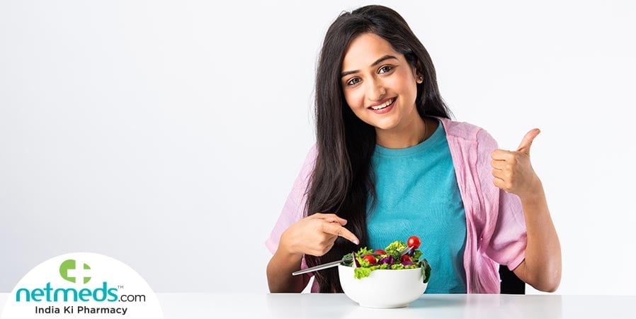 Girl showing thumbs up for vegan diet